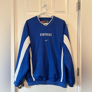NIKE TEAM SZ M TEAM KENTUCKY Blue and White Vneck windbreaker with mesh lining.